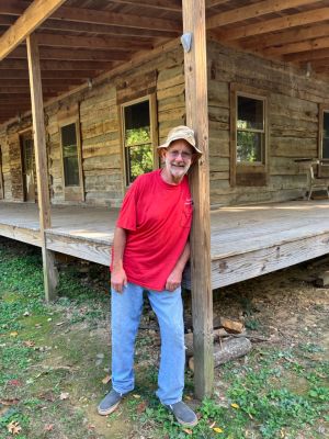 17132
October 2026. Mr. Paul Maloko at Camp with Mr Brian Shields taking photo
